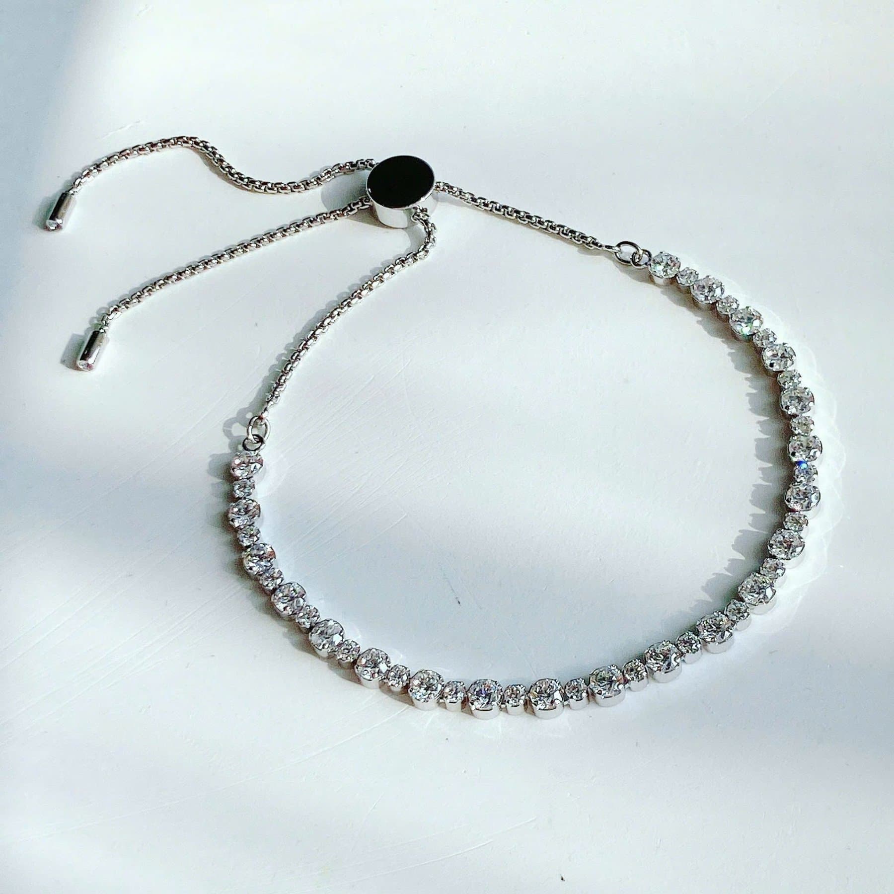 lắc trilogy dây rút